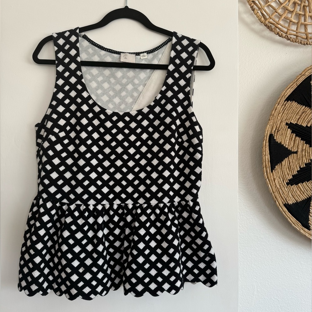 Anthropologie peplum floral sleeveless top